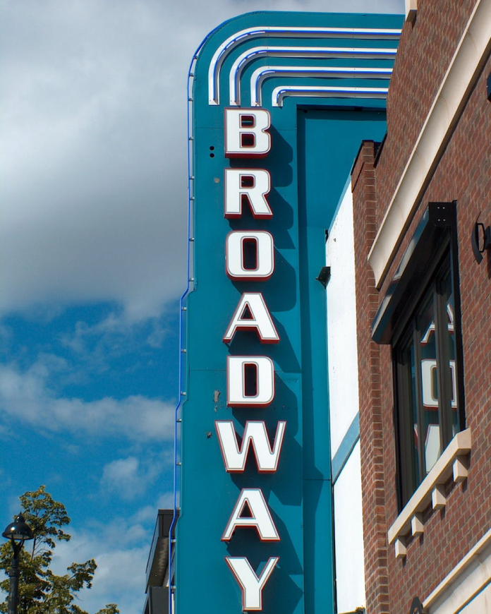 Illuminated sign outside a Broadway theatre