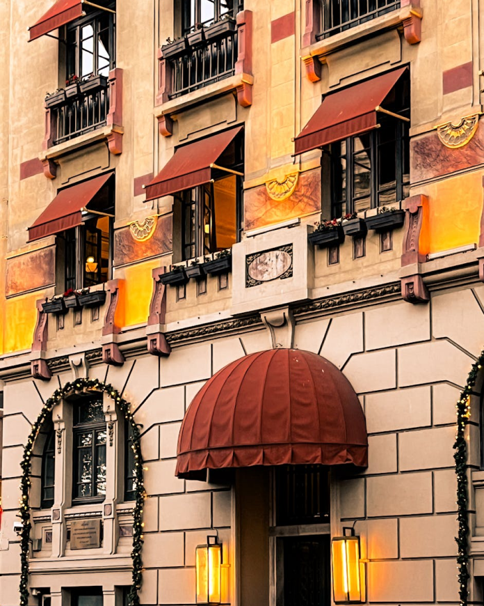 A flower-adorned hotel terrace with tasteful décor